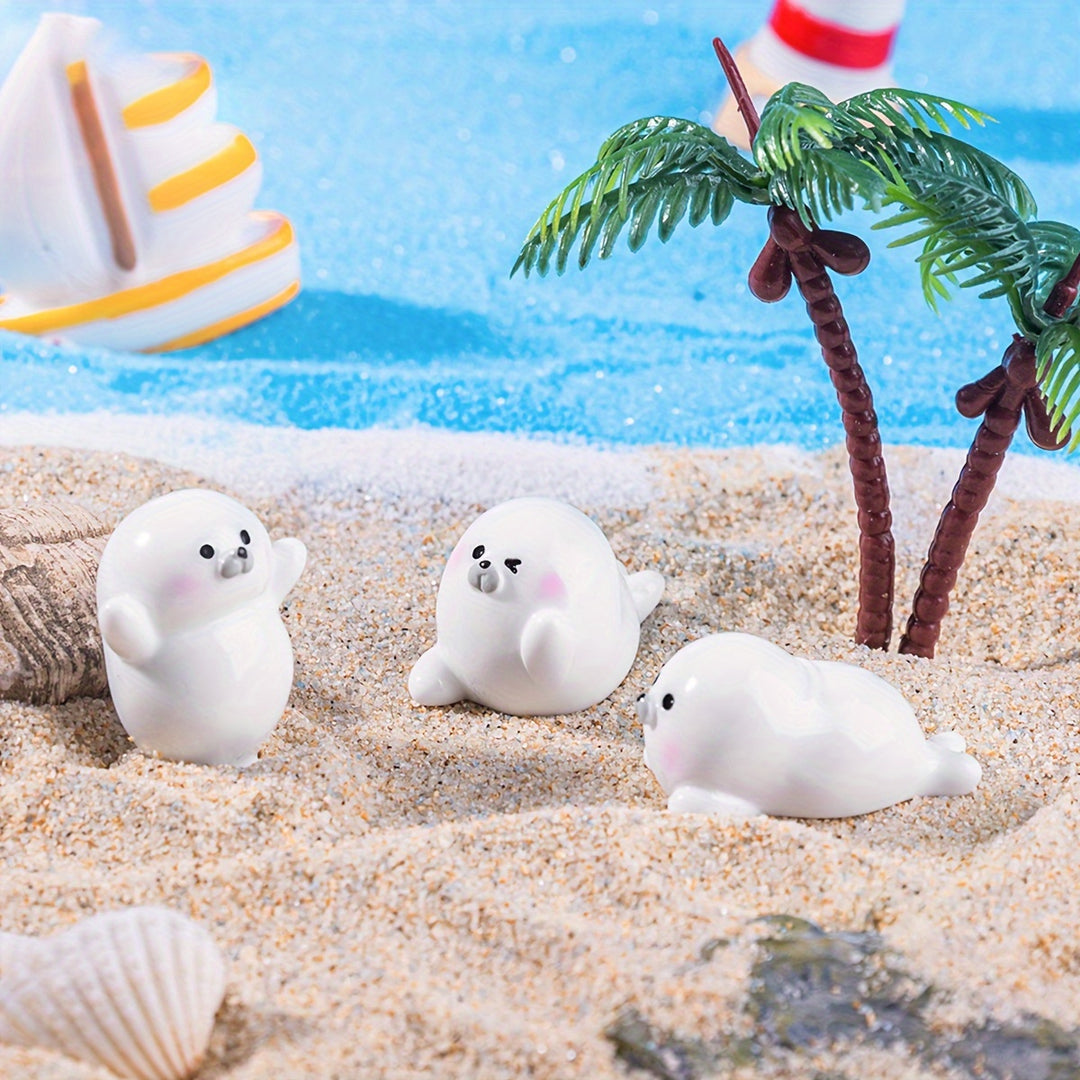 A Set of 4 Cute Creative Seal Ocean Animal Desktop Decorations, Featuring Mini Figurines.