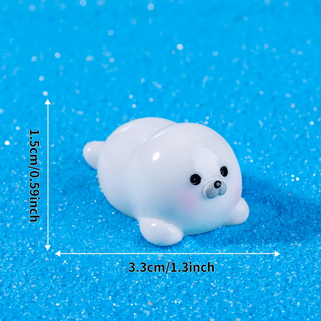 A Set of 4 Cute Creative Seal Ocean Animal Desktop Decorations, Featuring Mini Figurines.